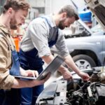 mechanics-working-in-car-service-BUJ82QF-1-e1598728429853-1